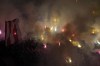 FILE - Red Star fans light fireworks during a Serbian national soccer league derby match between Red Star and Partizan, in Belgrade, Serbia, March 3, 2023. Former Manchester United defender Nemanja Vidic on Monday March 13, 2023, has withdrawn his candidacy for the president of the Serbian soccer federation, the organization which has often been accused of corruption, crime and political influence. The only candidate for the position of the FSS president now remains to be former footballer and veteran Red Star Belgrade official Dragan Dzajic who is believed to be close to the current populist Serbian leadership. (AP Photo/Darko Vojinovic, File)