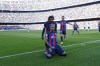 Barcelona's Raphinha celebrates scoring his side's opening goal during Spanish La Liga soccer match between Barcelona and Valencia at the Camp Nou stadium in Barcelona, Spain, Sunday, March 5, 2023. (AP Photo/Joan Monfort)