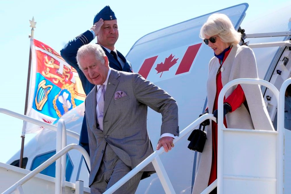 Prince Charles and Camilla, Duchess of Cornwall, disembark their plane in Yellowknife during part of the Royal Tour of Canada, Thursday, May 19, 2022. New polling results suggest Canadians are largely indifferent to their new king, and more than half believe his May 6 coronation is the right time for the country to reconsider its ties with the monarchy. THE CANADIAN PRESS/Paul Chiasson