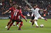 Liverpool's Mohamed Salah, right, attempts a shot on goal during the English Premier League soccer match between Bournemouth and Liverpool at the Vitality Stadium, Bournemouth, England, Saturday March 11, 2023. (Kieran Cleeves/PA via AP)