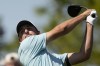 Scottie Scheffler hits from the fourth tee during the final round of The Players Championship golf tournament, Sunday, March 12, 2023, in Ponte Vedra Beach, Fla. (AP Photo/Eric Gay)