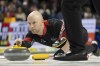 Team Ontario third, Ryan Fry makes a shot against Team Canada during the Tim Hortons Brier at Budweiser Gardens in London, Ont. on Saturday, March 4, 2023. The decorated Canadian curler has indicated on his social media accounts he's stepping back from competitive curling. THE CANADIAN PRESS / Nicole Osborne