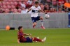 Real Salt Lake midfielder Damir Kreilach, bottom, falls as Vancouver Whitecaps defender Cristian Gutierrez collects the ball during the first half of an MLS soccer match Wednesday, July 7, 2021, in Sandy, Utah. Gutierrez has found a new home with Toronto FC. THE CANADIAN PRESS/AP-Rick Bowmer