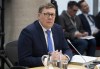 Saskatchewan Premier Scott Moe waits for a health-care meeting to begin with the prime minister, Tuesday, Feb. 7, 2023 in Ottawa.Moe announced the provincial government is to provide family doctors in rural and northern areas $200,000 over five years. THE CANADIAN PRESS/Adrian Wyld