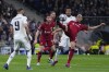Liverpool's Fabinho, right, controls the ball during the Champions League, round of 16 second leg soccer match between Real Madrid and Liverpool at the Santiago Bernabeu stadium in Wednesday, March 15, 2023. (AP Photo/Manu Fernandez)
