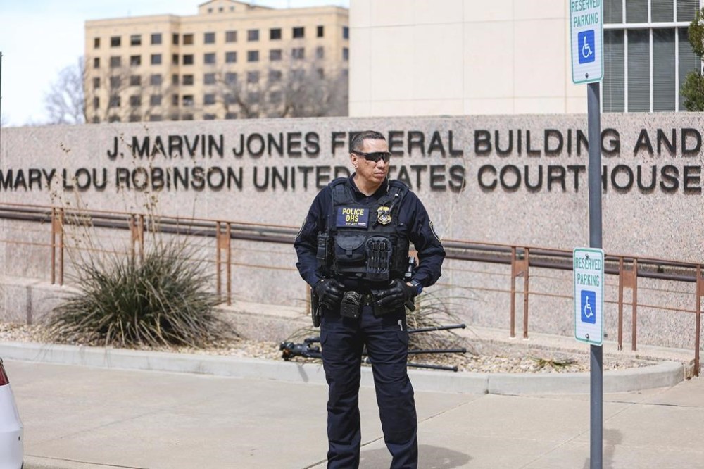 A Homeland Security Officer secures the scene outside the federal courthouse on Wednesday, March 15, 2023, in Amarillo, Texas, where a federal judge is expected to hear arguments in a lawsuit that takes aim at medication abortions. Pills are the the most common method for obtaining an abortion in the U.S. (AP Photo/David Erickson)