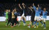 Napoli's players celebrate after winning the Champions League round of 16 second leg soccer match between SSC Napoli and Eintracht Frankfurt at the Diego Armando Maradona stadium in Naples, Italy, Wednesday, March 15, 2023. (AP Photo/Gregorio Borgia)