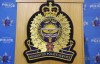 An Edmonton Police Service logo is shown at a press conference in Edmonton, Oct. 2, 2017. The Edmonton Police Service says in a news release that two patrol officers were killed while responding to a call Thursday. THE CANADIAN PRESS/Jason Franson