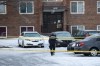 Police investigate the scene where two officers were shot and killed on duty in Edmonton on Thursday, March 16, 2023. THE CANADIAN PRESS/Jason Franson