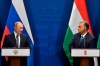 FILE - Hungarian Prime Minister Viktor Orban, right, and Russian President Vladimir Putin hold a joint press conference following their talks in Budapest, Hungary, Wednesday, Oct. 30, 2019. After Russia launched its war against Ukraine in Feb. 2022, Sweden and Finland dropped their longstanding military neutrality and quickly signaled their intentions to join the NATO military alliance. While Turkish President Recep Tayyip Erdogan has repeatedly raised specific objections to the countries — especially Sweden — joining NATO, Hungary’s populist Prime Minister Viktor Orban has long signaled that his country supports expanding the alliance, and has made repeated promises that the parliament in Budapest would soon vote to ratify. (Zoltan Mathe/MTI via AP, File)