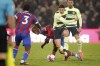 Manchester City's Julian Alvarez, second right, challenges for the ball with Crystal Palace's Wilfried Zaha during the English Premier League soccer match between Crystal Palace and Manchester City at Selhurst Park stadium, in London, Saturday, March 11, 2023. (AP Photo/David Cliff)