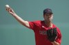 Boston Red Sox starting pitcher Corey Kluber throws in the first inning of a spring training baseball game against the Tampa Bay Rays in Fort Myers, Fla., Wednesday, March 15, 2023. (AP Photo/Gerald Herbert)