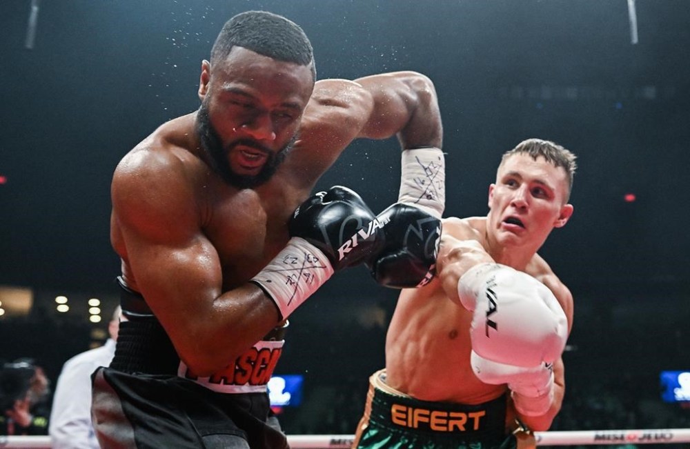 Micheal Eifert of Germany, right, lands a blow to Jean Pascal of Canada during their IBF light heavyweight elimination bout in Laval, Que., Thursday, March 16, 2023. THE CANADIAN PRESS/Graham Hughes