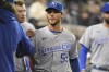 FILE - Kansas City Royals relief pitcher Jake Brentz is congratulated by teammates after being taken out of the game by manager Mike Matheny in the seventh inning of a baseball game against the Detroit Tigers, Friday, Sept. 24, 2021, in Detroit. Brentz and the Royals agreed to a $1.9 million, two-year contract that keeps him with the team as he recovers from Tommy John surgery, the team announced. (AP Photo/Jose Juarez, File)
