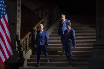 President Joe Biden, Mexican President Andres Manuel Lopez Obrador, and Canadian Prime Minister Justin Trudeau arrive for a news conference at the 10th North American Leaders' Summit at the National Palace in Mexico City, Tuesday, Jan. 10, 2023. U.S. President Joe Biden will spend two days in Canada beginning Thursday to meet with Prime Minister Justin Trudeau and speak to a joint session of Parliament, his first visit north of the border since taking the oath of office in 2021. THE CANADIAN PRESS/AP-Andrew Harnik