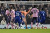 Chelsea's goalkeeper Kepa Arrizabalaga fails to save the goal from Everton's Ellis Simms during the English Premier League soccer match between Chelsea and Everton at Stamford Bridge stadium in London, Saturday, March 18, 2023. (AP Photo/Kirsty Wigglesworth)