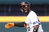 Netherlands batter Jurickson Profar reacts after hitting a solo home against Panama during the World Baseball Classic (WBC) at the Taichung Intercontinental Baseball Stadium in Taichung, Taiwan, Thursday, March 9, 2023. (AP Photo/I-Hwa Cheng)