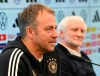 DFB Sports Director Rudi Voeller, right, and national men soccer team coach Hansi Flick, left, attend a news conference of the German Football Association, DFB, at the DFB Campus in Frankfurt, Germany, Monday, March 20, 2023. (Arne Dedert/dpa via AP)