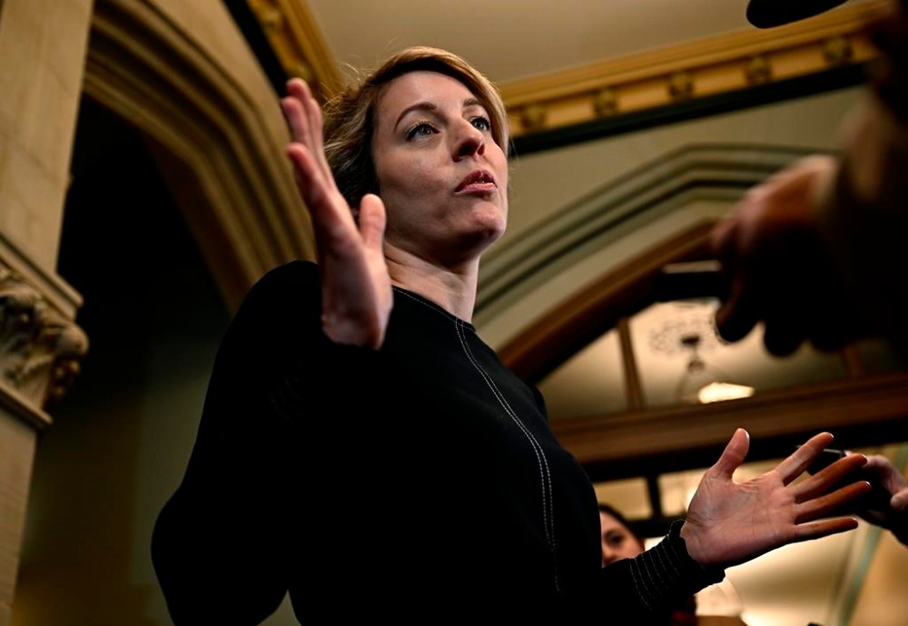 Minister of Foreign Affairs Melanie Joly speaks to reporters on Parliament Hill in Ottawa, on Wednesday, March 8, 2023. Joly says China’s attempts to broker peace in Ukraine will likely only help Russia re-arm and prolong the conflict. THE CANADIAN PRESS/Justin Tang