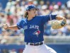 Toronto Blue Jays starting pitcher Kevin Gausman throws against the Tampa Bay Rays in the first inning of their spring training game in Dunedin, Florida on Friday, March 3, 2023. Gausman struck out six over five innings and Devonte Brown hit a three-run homer as the Toronto Blue Jays beat the Detroit Tigers 5-0 in spring training baseball action Monday. THE CANADIAN PRESS/Fred Thornhill