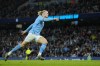 Manchester City's Erling Haaland celebrates after scoring his side's opening goal during the English FA Cup quarter final soccer match between Manchester City and Burnley at the Etihad stadium in Manchester, England, Saturday, March 18, 2023. (AP Photo/Jon Super)
