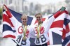 FILE - Britain's gold medalists Helen Glover, left, and Heather Stanning pose for photographs with their medals after the medal ceremony for the women's rowing pair rowing event at the Summer Olympics in Rio de Janeiro, Brazil, Friday, Aug. 12, 2016. Two-time Olympic rowing champion Helen Glover is making another comeback in a bid to qualify for a fourth Summer Games, saying she will be representing a “whole community of parents