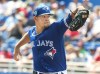 Toronto Blue Jays starting pitcher Jose Berrios throws against the Philadelphia Phillies during the first inning of spring training baseball action in Dunedin, Fla., on Sunday, March 5, 2023. THE CANADIAN PRESS/Fred Thornhill