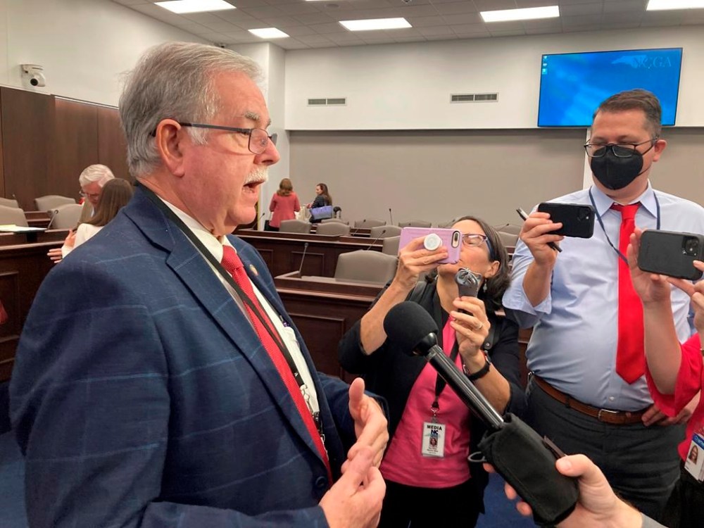 FILE - North Carolina state Rep. Donny Lambeth, R-Forsyth, speaks to reporters following the House Health Committee meeting at the Legislative Office Building in Raleigh, N.C., on Feb. 14, 2023. An agreement to expand Medicaid in the state neared final legislative approval Wednesday, March 22, 2023, as the House agreed to a bipartisan plan to ease or eliminate regulations that block the opening of new hospital beds or operating expensive equipment. Lambeth was a negotiator of the expansion bill. (AP Photos/Gary D. Robertson, File)