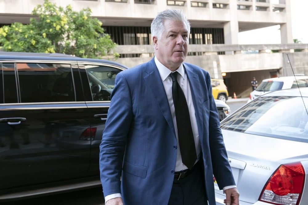FILE - Attorney M. Evan Corcoran arrives at federal court in Washington, July 22, 2022. (AP Photo/Jose Luis Magana, File)