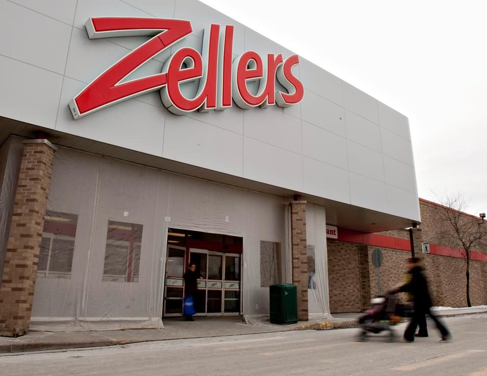 The comeback of Canadian retail chain Zellers officially kicks off, with the first 12 of 25 planned stores opening in Ontario and Quebec. Customers walk to a Zellers store in Quebec City on Thursday, January 13, 2011. THE CANADIAN PRESS/Jacques Boissinot