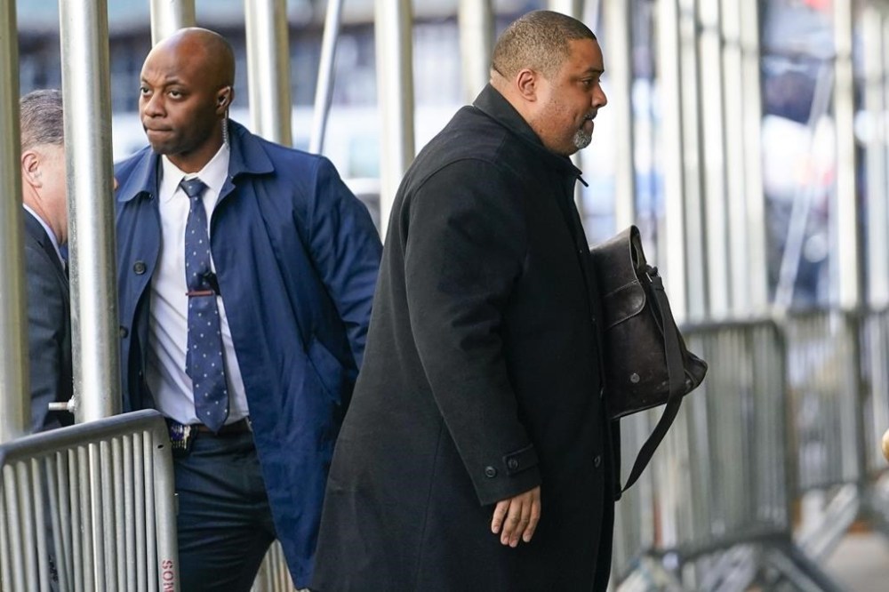 Manhattan District Attorney Alvin Bragg arrives at his office, Thursday, March 23, 2023, in New York. A New York grand jury investigating Trump over a hush money payment to a porn star appears poised to complete its work soon as law enforcement officials make preparations for possible unrest in the event of an indictment. (AP Photo/Mary Altaffer)