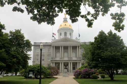 FILE - The New Hampshire Statehouse stands on June 2, 2019, in Concord, N.H. In a victory for abortion-rights supporters, the Republican-led but closely divided New Hampshire House on Thursday, March 23, 2023, rejected multiple bills to further restrict abortion access while also approving legislation to protect it. (AP Photo/Holly Ramer, File)
