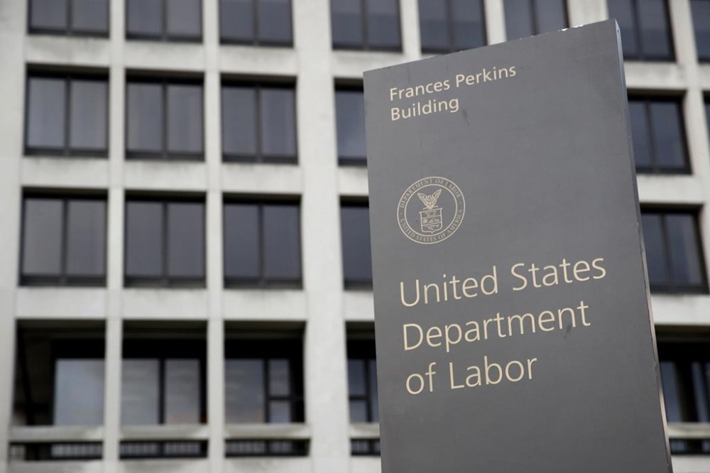 FILE - A sign stands outside the Department of Labor's headquarters in Washington, May 6, 2020. The U.S. House has failed to override President Joe Biden’s first veto on Thursday, March 23, 2023. The House was trying to override Biden's veto of a Republican-led bill that would have banned the consideration of environmental, social or governance issues in investment decisions. (AP Photo/Patrick Semansky, File)