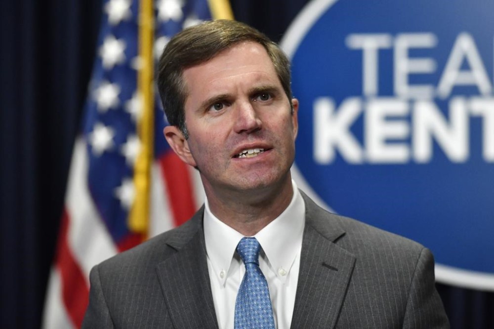 FILE - Kentucky Gov. Andy Beshear addresses reporters during a press conference in Frankfort, Ky., Nov. 15, 2022. Beshear has vetoed a sweeping Republican measure aimed at regulating the lives of transgender youths, Friday, March 24, 2023. The bill would ban their access to gender-affirming health care. (AP Photo/Timothy D. Easley, File)