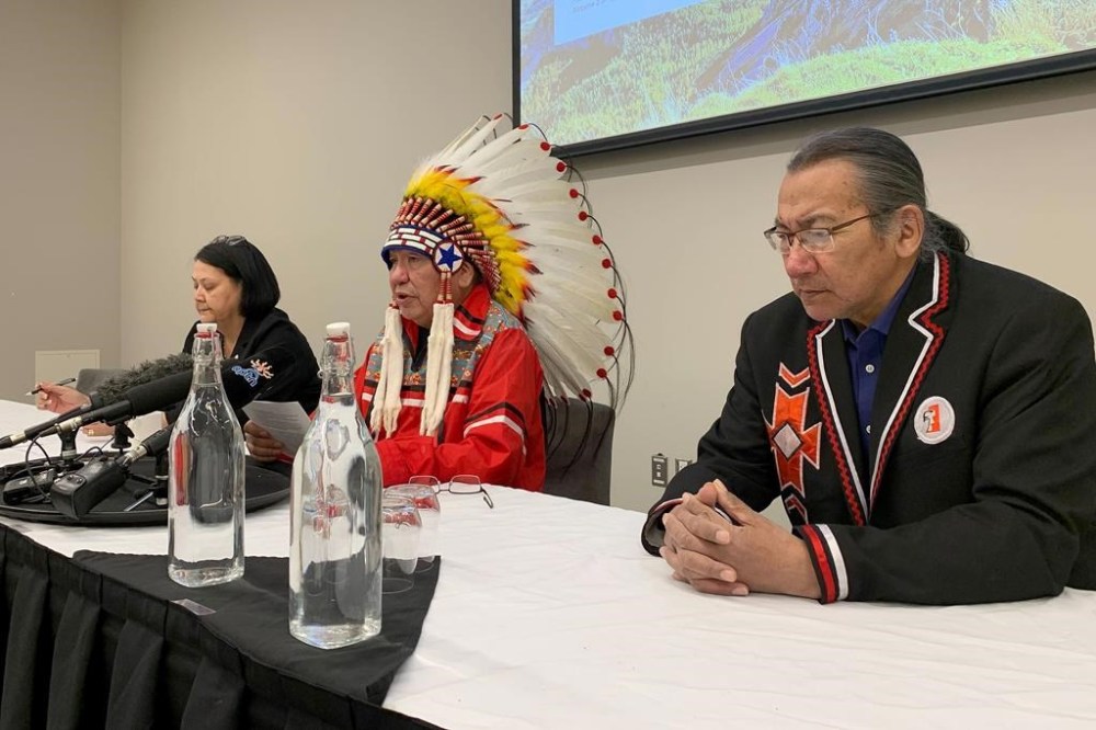 Assembly of Manitoba Chiefs Grand Chief Cathy Merrick, St. Theresa Point First Nation Chief Elvin Flett, Gregory Wood, band councillor with St. Theresa Point First Nation take part in a press conference in Winnipeg, Friday, March 24, 2023. Flett believes drug use played a role in the deaths of two 14-year-old girls earlier this month. THE CANADIAN PRESS/Brittany Hobson