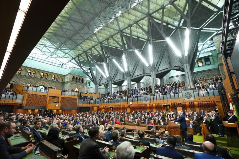 Parliamentarians look on as U.S. President Joe Biden addresses Parliament in the House of Commons, on Parliament Hill, in Ottawa, Friday, March 24, 2023. THE CANADIAN PRESS/Sean Kilpatrick
