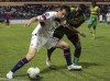 U.S. Brenden Aaronson, left, fights for the ball with Grenada's Benjamin Ettienne, during a CONCACAF Nations League soccer match in Saint George, Grenada, Friday, March 24, 2023. (AP Photo/Haron Forteau)