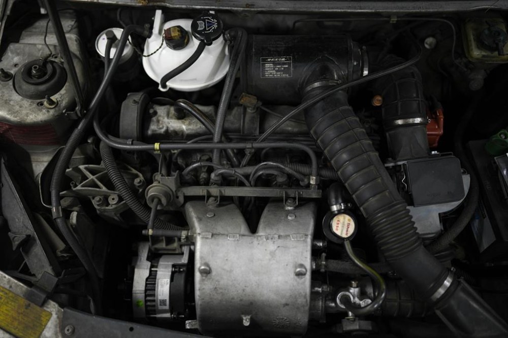 FILE - The motor of a combustion engine car is pictured at a garage in Marseille, southern France, Wednesday, June 8, 2022. Germany and the European Union said Saturday, March 25, 2023 that they reached an agreement in their dispute over the future of cars with combustion engines allowing the registration of new vehicles with combustion engines even after 2035 if they use climate-neutral fuel only. (AP Photo/Daniel Cole, File)