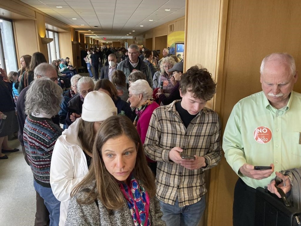 FILE - People line up, March 20, 2023, outside a hearing room in the Oregon state Capital in Salem, Ore., where a public hearing was being held on a bill seeking to expand access to abortion and gender-affirming care. In legislative sessions in 2023, GOP-controlled states have been moving to tighten abortion restrictions and those dominated by Democrats have continued to codify protections to abortion access. (AP Photo/Andrew Selsky, File)