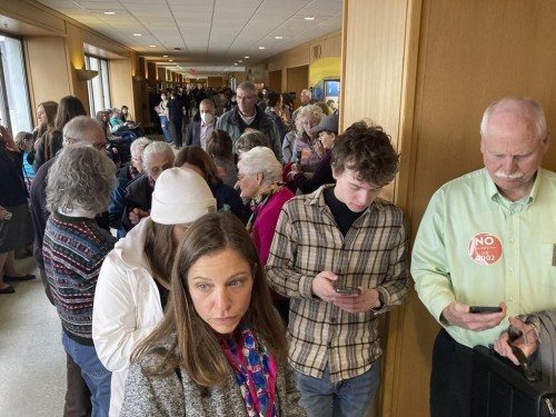 FILE - People line up, March 20, 2023, outside a hearing room in the Oregon state Capital in Salem, Ore., where a public hearing was being held on a bill seeking to expand access to abortion and gender-affirming care. In legislative sessions in 2023, GOP-controlled states have been moving to tighten abortion restrictions and those dominated by Democrats have continued to codify protections to abortion access. (AP Photo/Andrew Selsky, File)