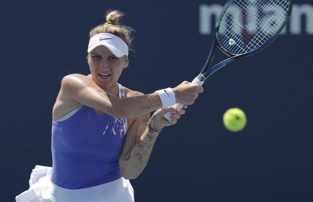 Marketa Vondrousova, of the Czech Republic, returns a volley against Karolina Pliskova, of the Czech Republic, at the Miami Open tennis tournament, Sunday, March 26, 2023, in Miami Gardens, Fla. (AP Photo/Jim Rassol)