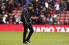 FILE - Tottenham's head coach Antonio Conte walks off the field after a English Premier League soccer match against Southampton at St. Mary's Stadium in Southampton, England, Saturday, March 18, 2023. Tottenham announced that manager Antonio Conte has left the Premier League club 