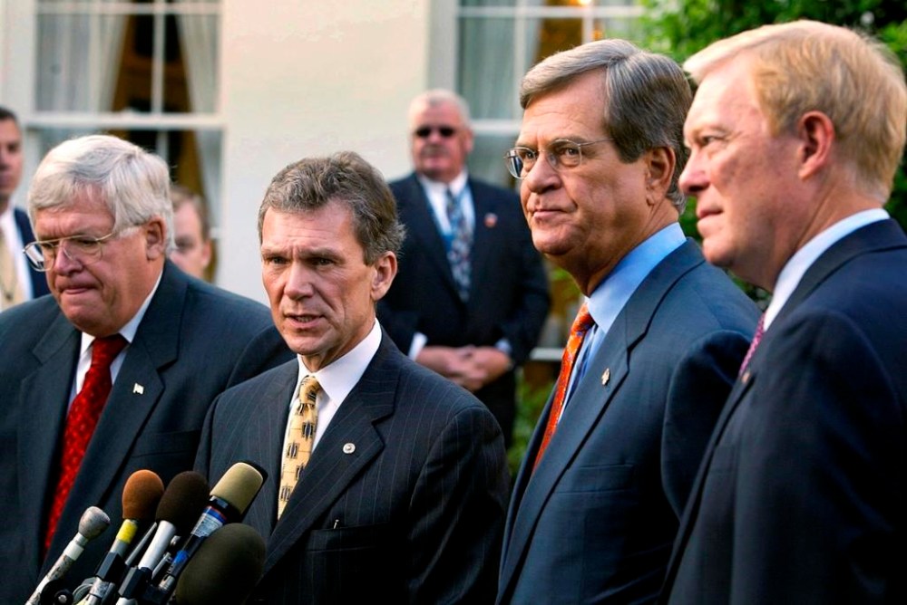 FILE - Senate Majority Leader Tom Daschle, D-S.D., center, talks to reporters with Senate Minority Leader Trent Lott, R-Miss, House Minority Leader Dick Gephardt, right, D-Mo., and Speaker of the House of Representatives Dennis Hastert, left, R-Ill., look on, following a breakfast meeting with President George W. Bush on Iraq in the White House Oval Office, Wednesday, Oct 2, 2002. (AP Photo/Doug Mills, File)