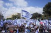 Israelis protest against Prime Minister Benjamin Netanyahu's judicial overhaul plan outside the parliament in Jerusalem, Monday, March 27, 2023. (AP Photo/Ohad Zwigenberg)