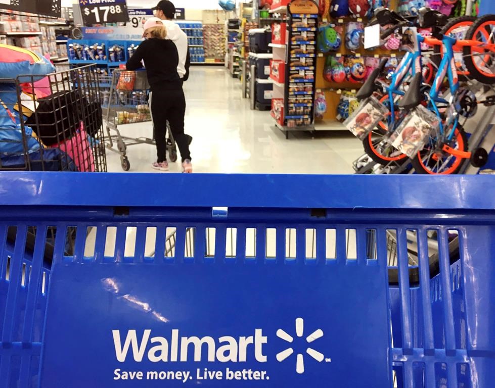 Although the heads of Canadian grocers pushed for MPs to also call on Walmart and Costco to testify for their research into food inflation, experts say the presence of those American retail giants in Canada isn't likely to blame for rising grocery prices. Customers shop for food at Walmart in Salem, N.H., Monday, June 5, 2017. THE CANADIAN PRESS/AP-Elise Amendola