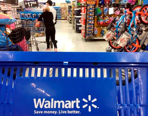 Although the heads of Canadian grocers pushed for MPs to also call on Walmart and Costco to testify for their research into food inflation, experts say the presence of those American retail giants in Canada isn't likely to blame for rising grocery prices. Customers shop for food at Walmart in Salem, N.H., Monday, June 5, 2017. THE CANADIAN PRESS/AP-Elise Amendola