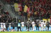 Belgium players celebrate their win against Germany in front of Belgium spectators after the end of the international friendly soccer match between Germany and Belgium in Cologne, Germany, Tuesday March 28, 2023. The match ends 2-3. (AP Photo/Martin Meissner)