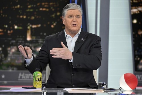 FILE- Fox News commentator Sean Hannity speaks during an interview at Fox News Studios, March 16, 2023, in New York. Tucker Carlson, Hannity and Bret Baier are among the stars that both Fox News and the voting machine company suing it for defamation have signaled could testify if the explosive case heads to trial next month.(Photo by Evan Agostini/Invision/AP)