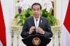 In this photo released by the Press and Media Bureau of the Indonesian Presidential Palace, Indonesian President Joko Widodo delivers his statement at Merdeka Palace in Jakarta, Indonesia, Tuesday, March 28, 2023. Widodo said Tuesday that his administration is trying to save the FIFA Under-20 World Cup following the cancelation of the official draw for group assignments in the youth soccer tournament, after regional governors and protesters demanded Israel's team be excluded. (Indonesian Presidential Palace via AP)