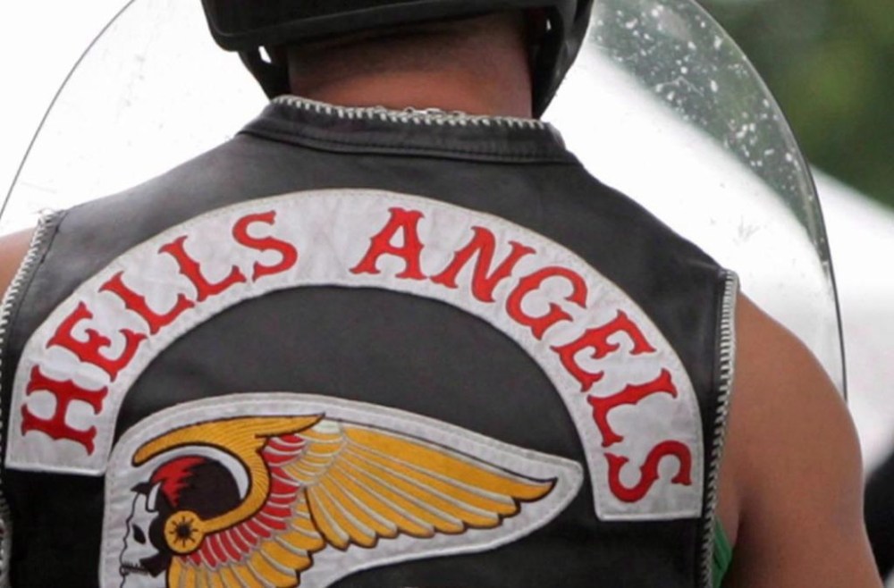 Several police forces across Quebec are conducting joint anti-drug trafficking raids across the province targeting members of the Hells Angels and the mafia. Members of the Hells Angels arrive at a property in Langley, B.C., on July 25, 2008. THE CANADIAN PRESS/Darryl Dyck